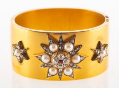 An impressive Victorian diamond, pearl and ruby bangle,