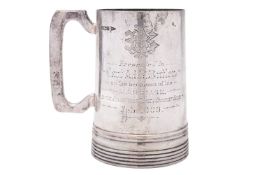 An Edwardian silver one pint mug, circular tapering form,