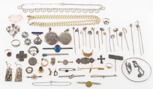 A mixed collection of silver and costume jewellery, including two foliate and floral carved lockets,