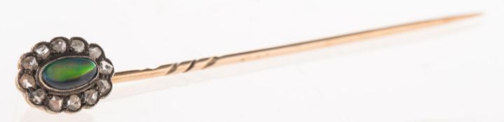 An antique black opal and diamond stick pin, the pin head of cluster style,
