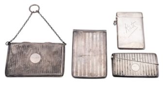 Four silver card cases, one with a patent slide opening, one inscribed 