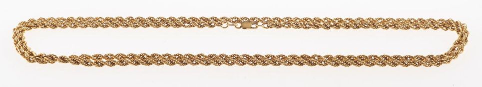 A long rope twist chain, marked 10k, indistinct mark to lobster catch, length approx. 82.0cm, 8.