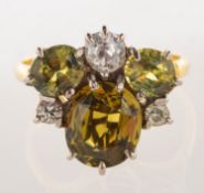 A 1980's 18ct gold chrysoberyl and diamond insect ring, in the form of an insect,