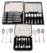 Three cased sets of silver flatware/ cutlery, comprising of a set of six coffee spoons,