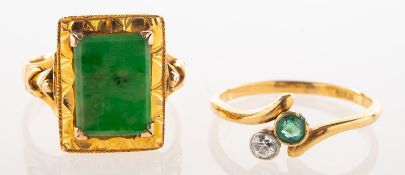 Two dress rings, including an ornately designed rectangular ring, (possibly of Chinese origin),