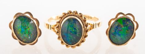 A 9ct gold opal triplet ring and a pair of opal triplet set earrings,