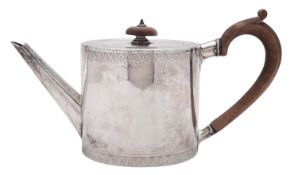 An Edwardian silver tea pot, circular form, with bright-cut engraved borders,