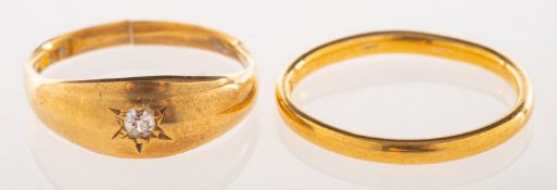 Two rings, an 18ct gold gypsy style ring, star set with a small old-cut diamond,