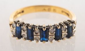 An 18ct gold sapphire and diamond ring,