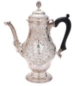 A George III North Country provincial silver coffee pot, of baluster form,