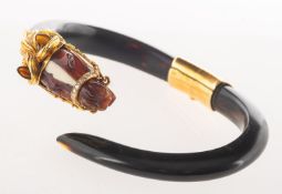 Gay Frères, A 1970's 18ct gold and diamond horse head bangle,