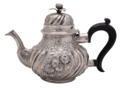 A Victorian small silver tea pot, baluster form,