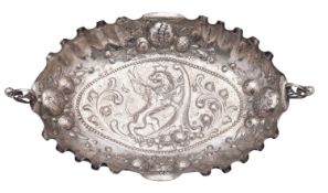 A late 19th/ early 20th century continental silver sweetmeat dish, shaped navette outline,