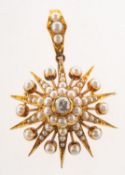 A Victorian diamond and pearl starburst brooch pendant,