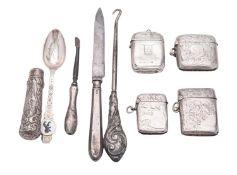 Four silver vesta cases, all rounded rectangular form with applied suspensory rings, two initialled,