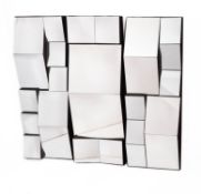 A set of three contemporary wall mirrors