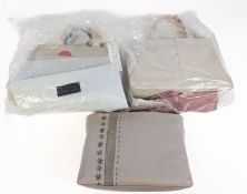 Radley. Three Radley handbags, including