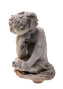 A lead garden model of a putto with a fi