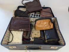 A collection of handbags and purses with