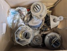A mixed collection of oil lamps and lamp