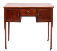 An Edwardian mahogany serpentine fronted