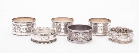 Three silver napkin rings, all initialle