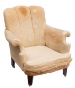 A pair of Edwardian low armchairs, fully