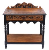 A late 19th Century carved oak and eboni