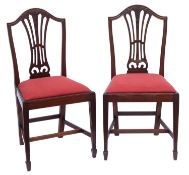A set of four mahogany dining chairs in