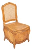 A beechwood Fauteuil in the Louis XV tas