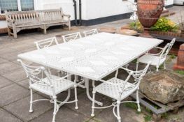 A substantial cream painted metal garden