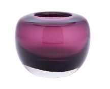 An amethyst art glass bowl of squat glob