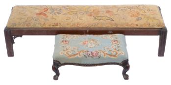 A Victorian carved walnut oblong footsto