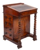 A Victorian walnut Davenport, the supers
