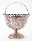 A 20th century silver plated swing handl