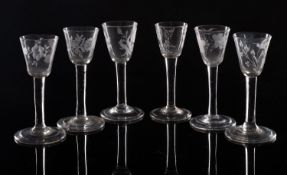 Six wine glasses with round funnel shape
