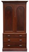 A Victorian mahogany linen press, the up