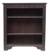 A late 19th Century carved dark oak low