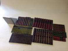 Six faux book-spine panels. With metal stands.