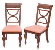 A pair of Regency style hall chairs, ha