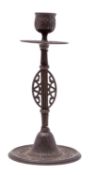 A North American cast iron candlestick,