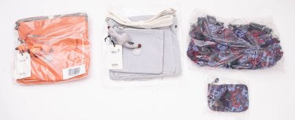 Kipling. A group of three handbags and a