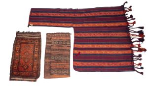 A Turkoman grain bag, the brick red fiel