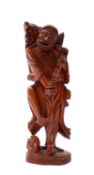 A Chinese carved hardwood figure of the