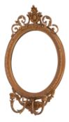 A Victorian gilt gesso oval girandole mirror
