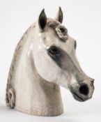 Catriona McLeod [b 1946] a raku fired stoneware sculpture, of a horses head with plaited mane, 29.