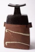 *Janet Leach [1918 - 1997] a slab built stoneware vase with lug handles,
