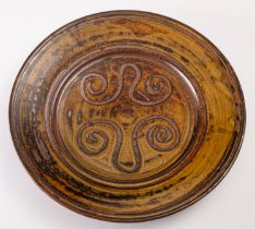 A large stoneware charger,