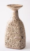 *Dame Lucie Rie DBE [1902-1995] a white stoneware vase,