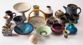 A mixed group of studio pottery, primarily unmarked and comprising stoneware and porcelain,